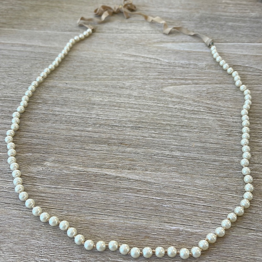 Long pearl beaded necklace